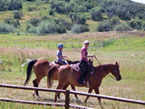 1251590897_landyn & annie in meadow